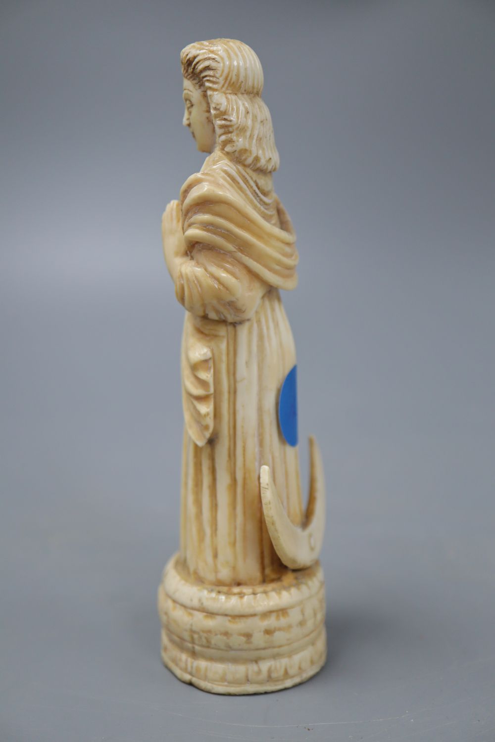 An 18th century Indo-Portuguese ivory carving of a saint, height 14cm